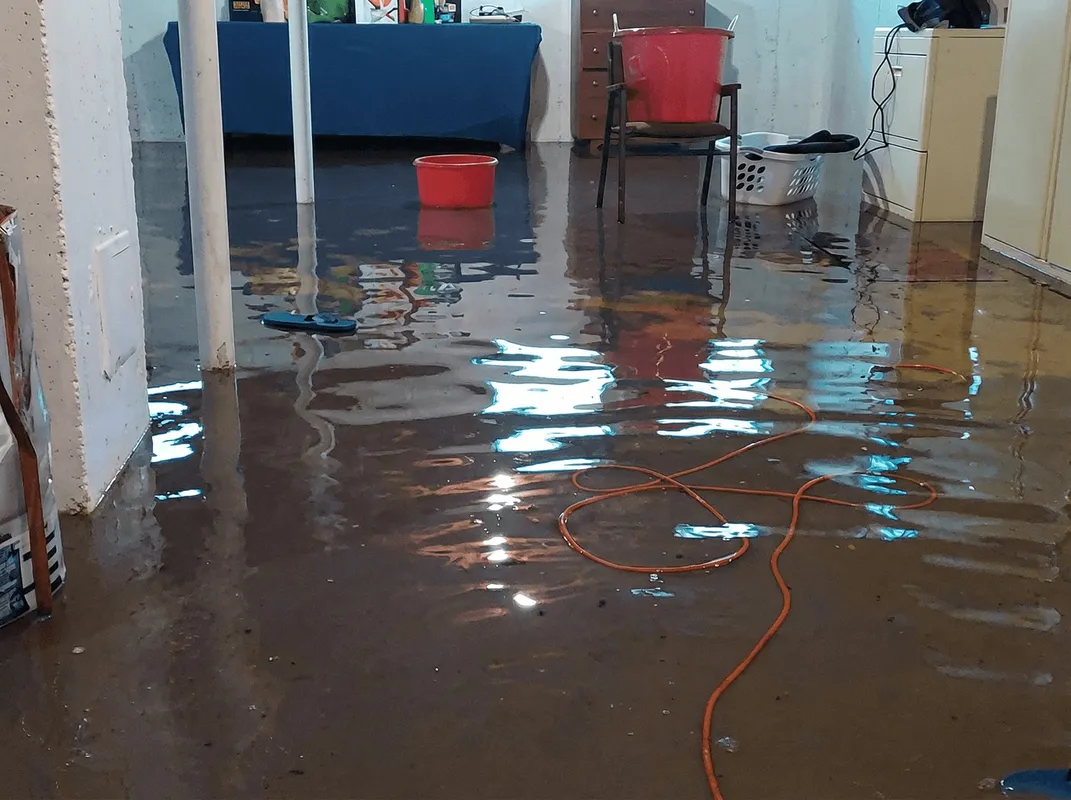 Basement with boiler, cabinets and washing machine completely flooded in Austin, TX
